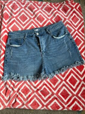 Women’s Distressed Blue Denim Jean Shorts with Frayed Hem